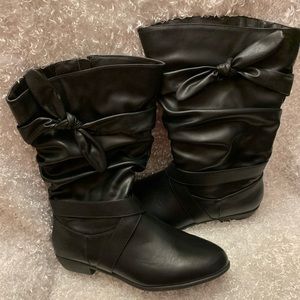 Woman Within Black Wide-Calf Boots with Bow.